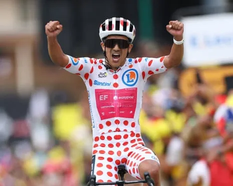EF Education - EasyPost's Richard Carapaz wearing the polka dot jersey celebrates winning stage 20.