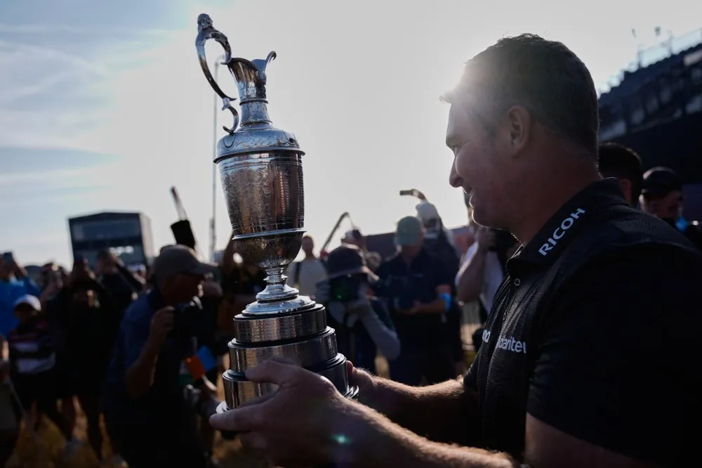 Ryan Fox of New Zealand poses with the Claret Jug trophy after winning the British Open Golf championships at Royal Birkdale golf club, in Southport, England, Sunday, July 19, 2026. (AP Photo/David Goldman)